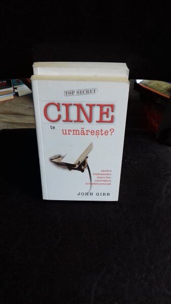 CINE TE URMARESTE? - JOHN GIBB