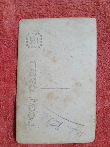 Fotografie tip carte postala, barbat si femeie in costume populare, inceput de secol XX