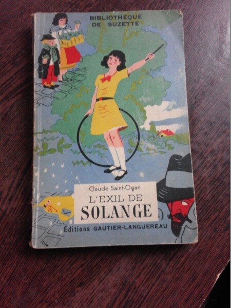 L'EXIL DE SOLANGE - CLAUDE SAINT-OGAN  (CARTE IN LIMBA FRANCEZA)