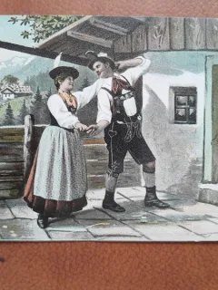Carte postala, barbat si femeie in costume traditionale, inceput de secol XX