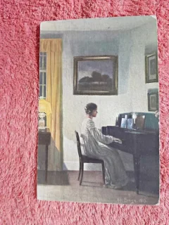 Carte postala, tanara cantand la pian, 1913