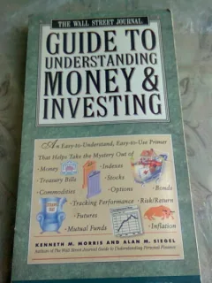 GUIDE TO UNDERSTANDING MONEY AND INVESTING - KENNETH M. MORRIS  (CARTE IN LIMBA ENGLEZA)