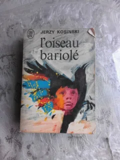 L'OISEAU BARIOLE - JERZY KOSINSKI  (CARTE IN LIMBA FRANCEZA)