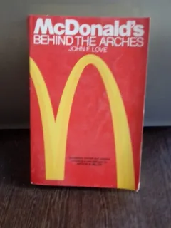 MCDONALD'S BEHIND THE ARCHES - JOHN F. LOVE   (MCDONALD, IN SPATELE CUPOLELOR)