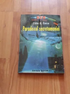 PARADOXUL SECRETOMANIEI-CALIN N. TURCU