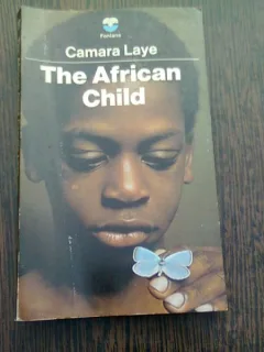 THE AFRICAN CHILD - CAMARA LAYE  9CARTE IN LIMBA FRANCEZA)