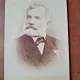 Fotografie barbat cu barba si mustata, pe carton, sfarsit de secol XIX