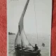 Fotografie tip carte postala, cu barca pe mare la Mangalia, 1937