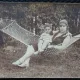 Fotografie tip Carte Postala, Femeie cu copil in hamac, 1928