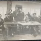 Fotografie tip Carte Postala, Grup de barbati la masa, perioada interbelica
