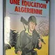 UNE EDUCATION ALGERIENNE - GUY VIDAL, ALAIN BIGNON  (CARTE CU BENZI DESENATE, TEXT IN LIMBA FRANCEZA)