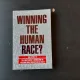 WINNING THE HUMAN RACE? - SADRUDDIN AGA KHAN  (CARTE IN LIMBA ENGLEZA)